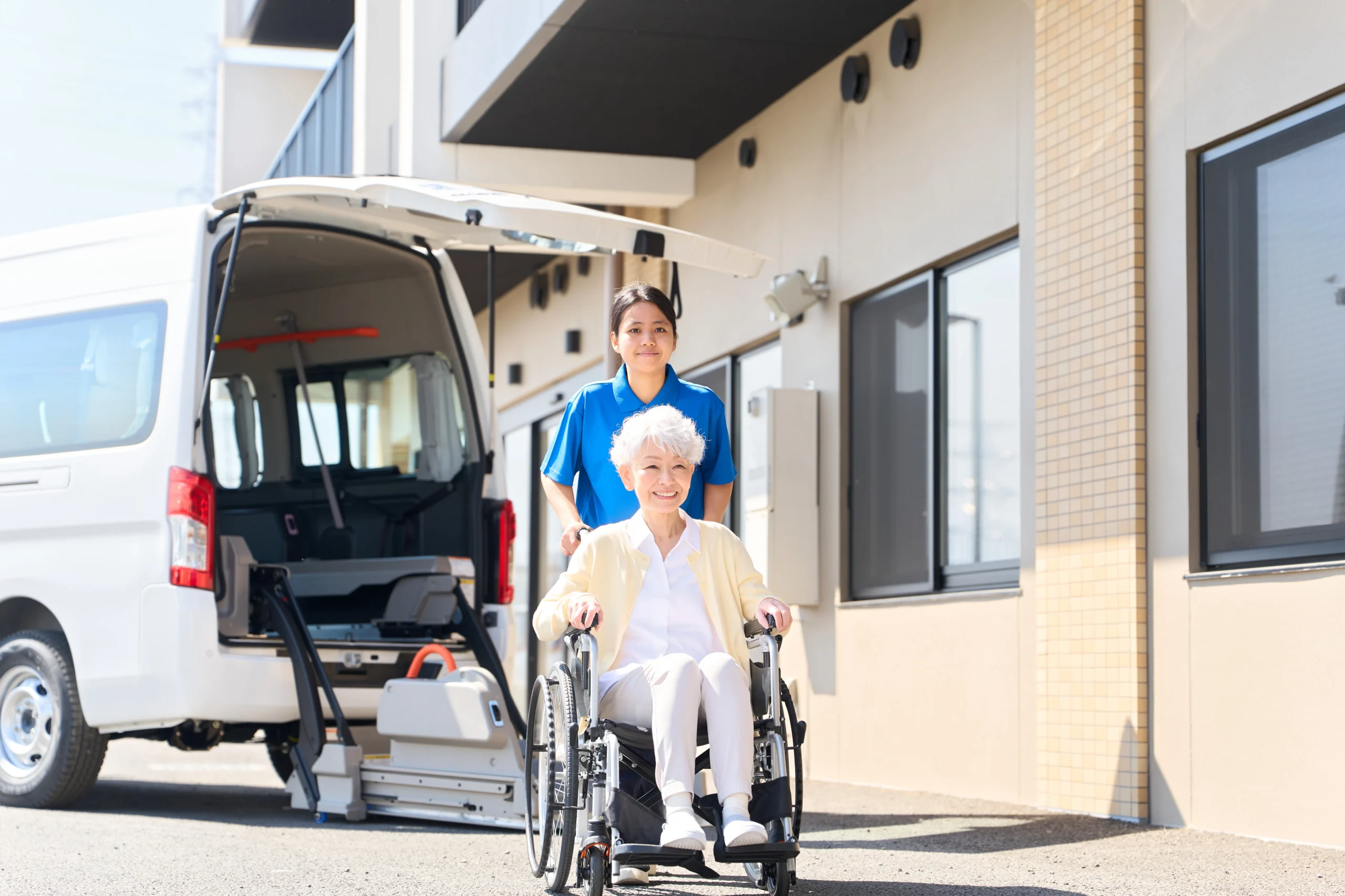 female-caregiver-assisting-senior-woman-in-wheelch-2026-07-02-21-39-03-utc